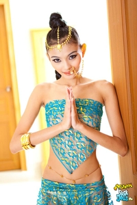 Petite Thai babe in authentic dress