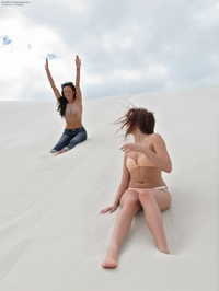 Breanne and Cassie playing in the desert