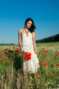 Erotic young girl Valeria in a grain field