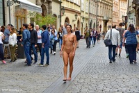 Isabelle walking naked on the street