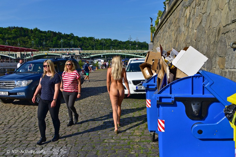 Bianca walking naked at river