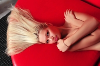Mila in red room