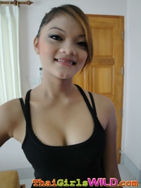 Sexy thai babe stripping at home