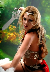 Amazon babe posing with two swords