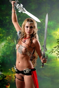 Amazon babe posing with two swords