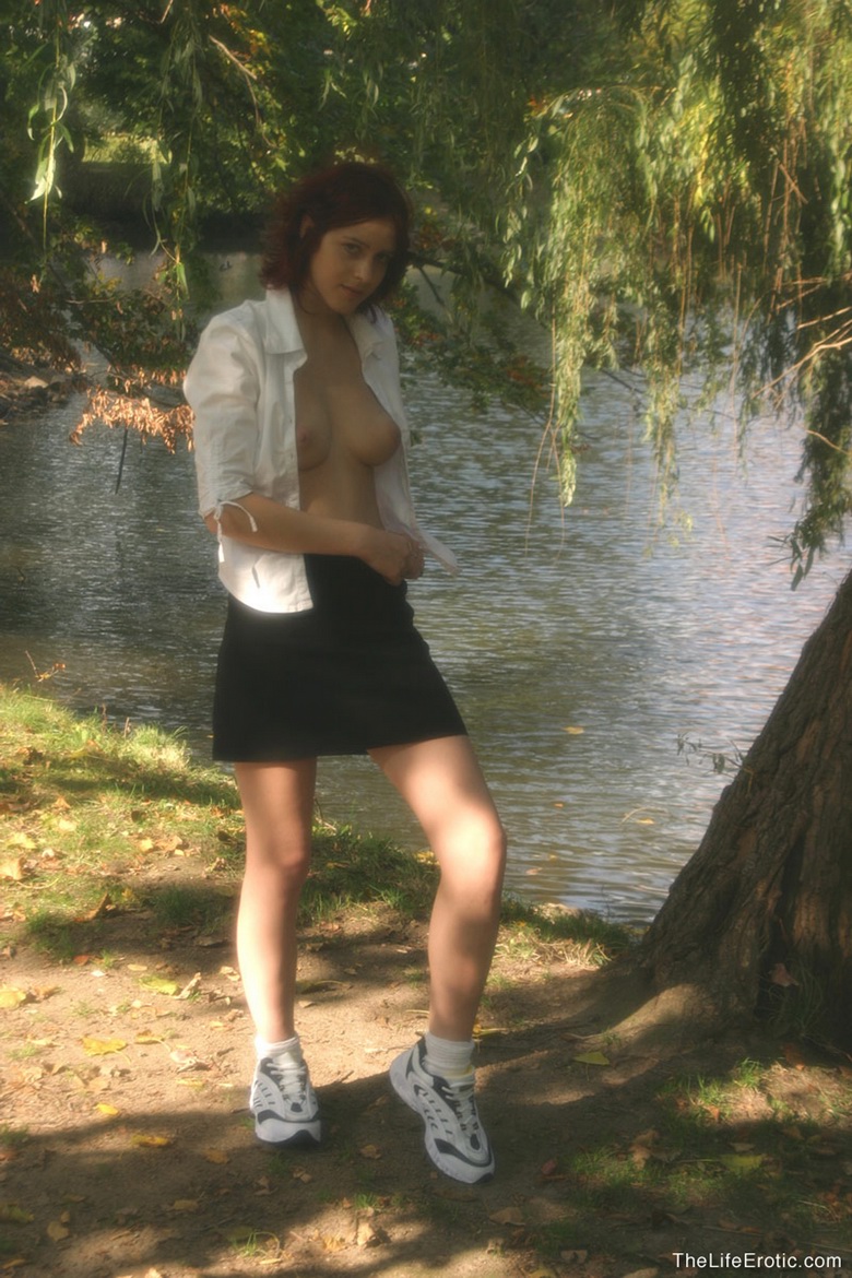 Kathi	gets naked outdoors