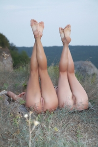 Oliana & Raisa posing naked outdoor