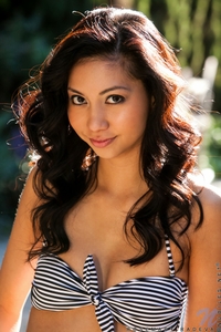 Rosemary Radeva pulls down jeans