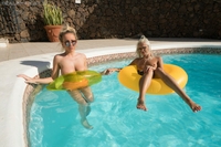 Beth & Miah have fun in the villa pool