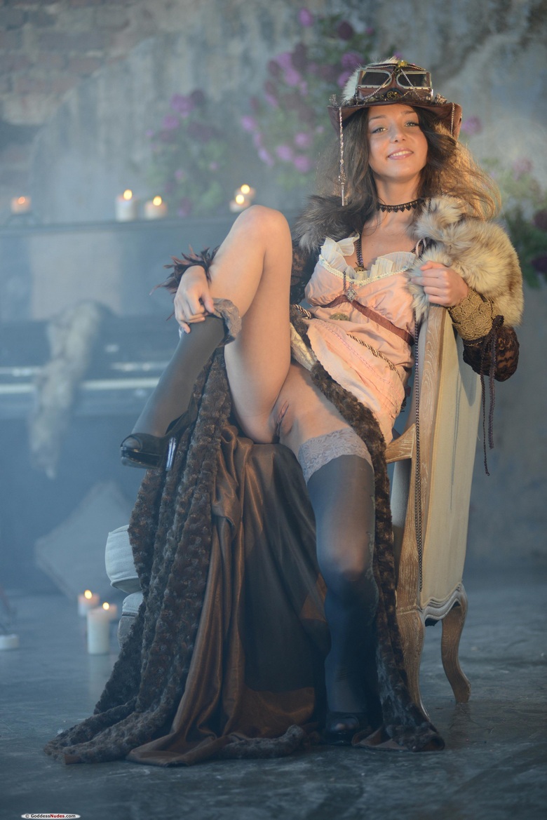 Nensi pulls down her costume
