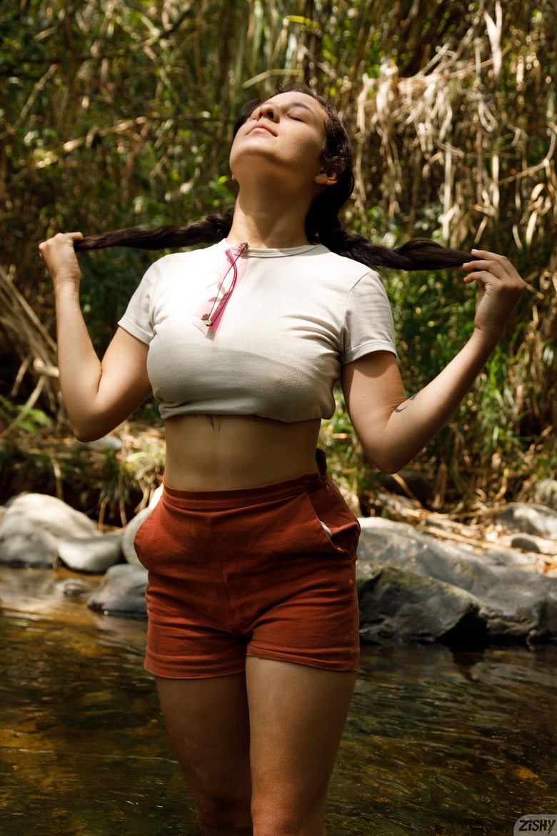 Mel Castaneda in the forest creek